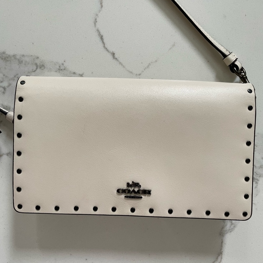 Ivory Coach crossbody purse. Genuine leather, exquisite stud details.